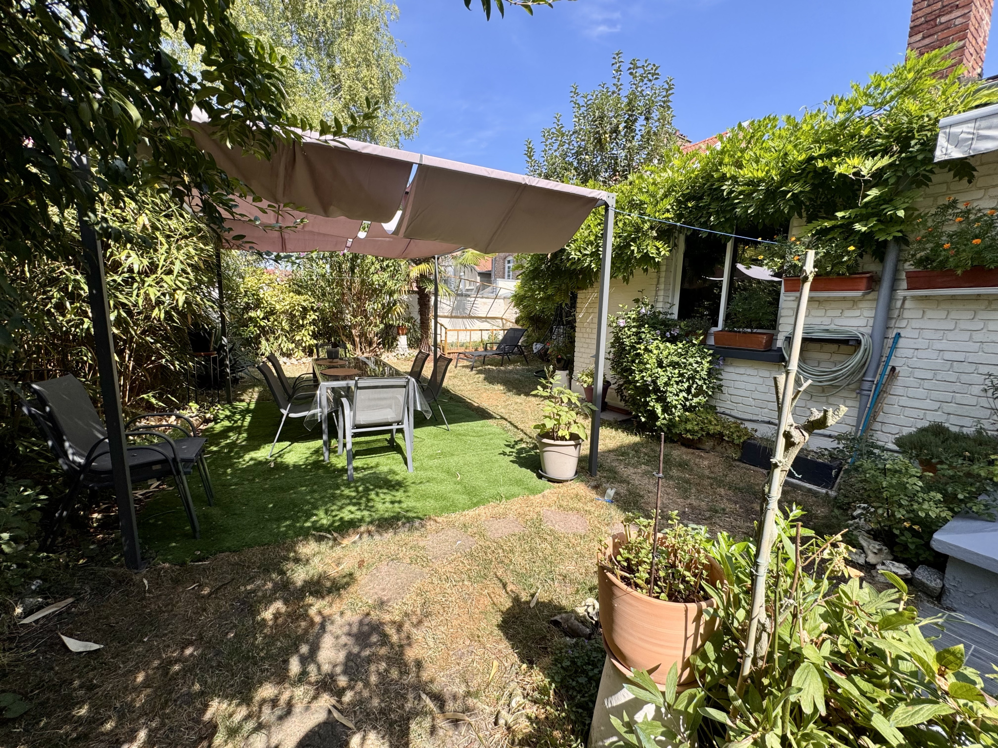 Immo80 – L'immobilier à Amiens et dans la Somme-Henriville – Garage & Jardin