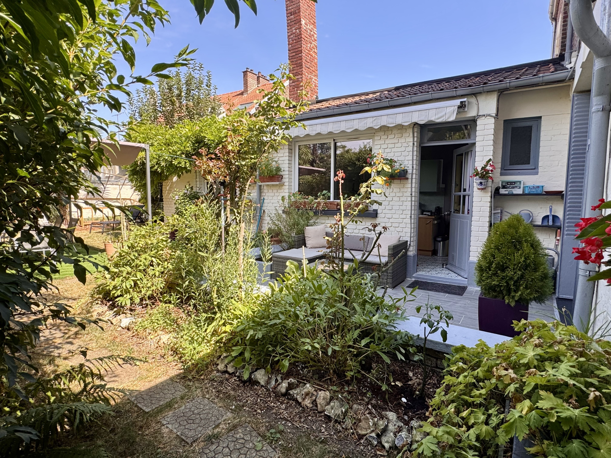 Immo80 – L'immobilier à Amiens et dans la Somme-Henriville – Garage & Jardin